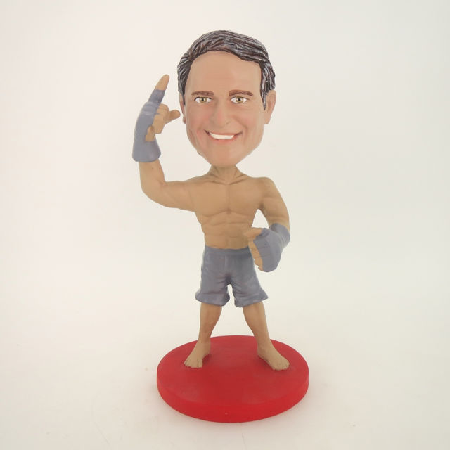 Picture of Custom Bobblehead Doll: Muscle Man Reading Boxing